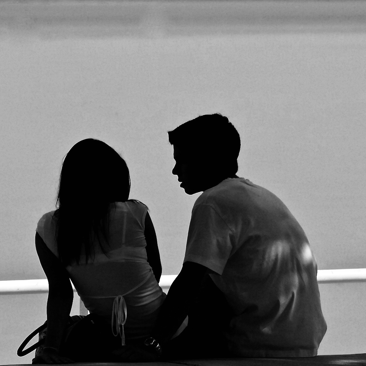 Two adults speaking directly during a relationship conversation